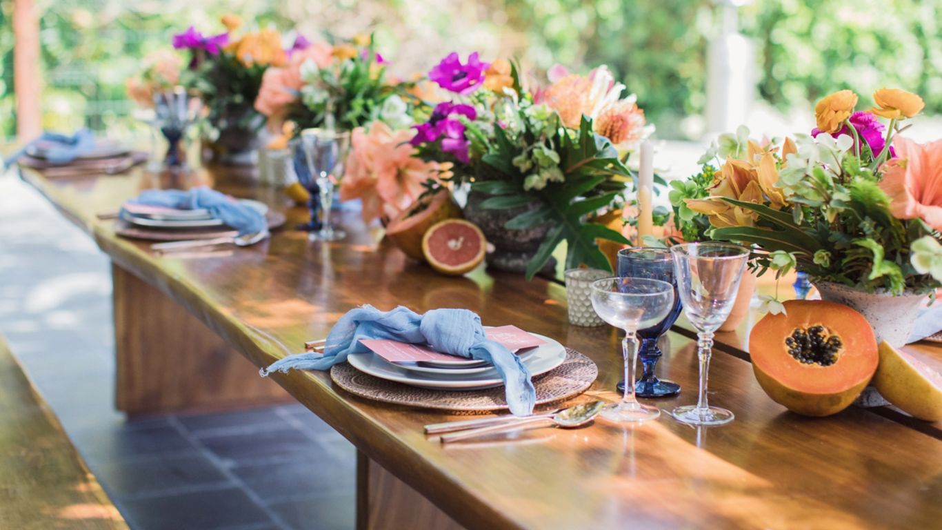 color table setting and floral and fruit centerpieces 